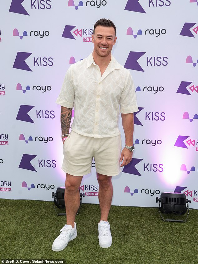 The ballroom favourite, 29, kept it smart in a cream co-ord including a shirt and matching trunks