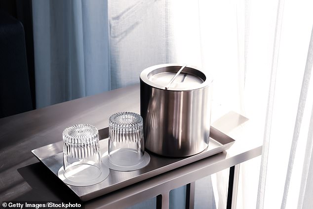 Experts advise rinsing hotel glasses and avoiding ice buckets without liners ¿ one outbreak was traced to guests vomiting in them