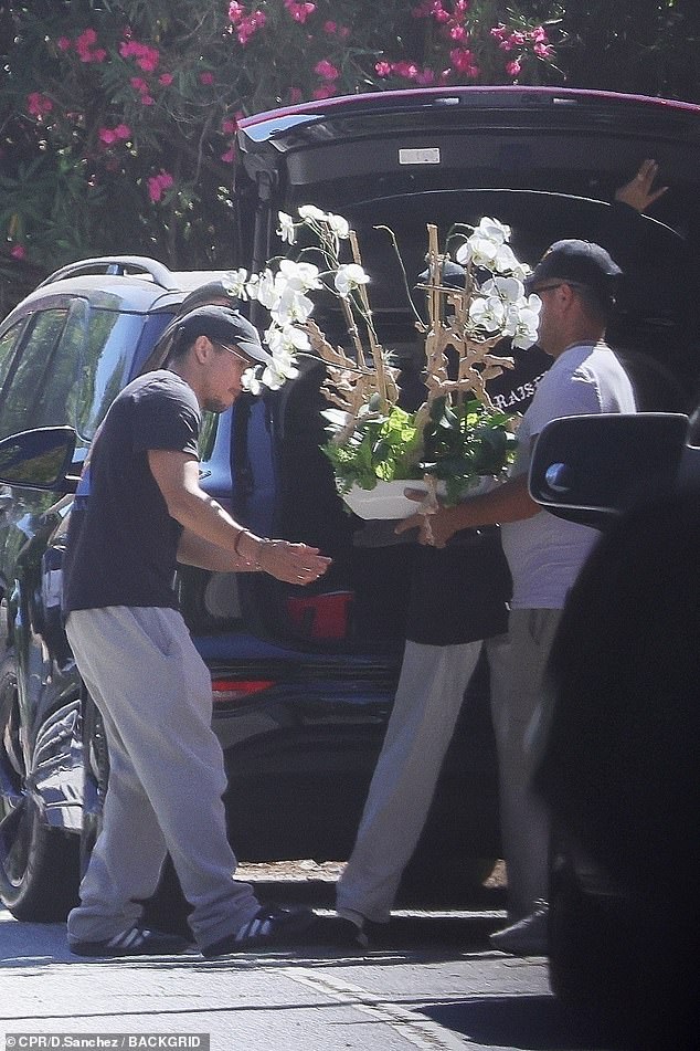 After their extended makeout session, Danny was spotted receiving a large floral arrangement delivered to his doorstep