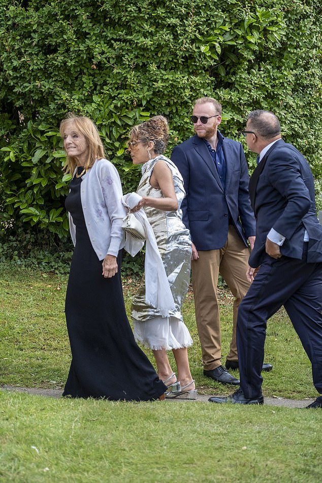Michelin star chef Baroness Ruth Rogers arrives alongside other guests to the wedding in Great Tew
