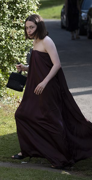 Another opted for an all black look for the 'society wedding of the year'