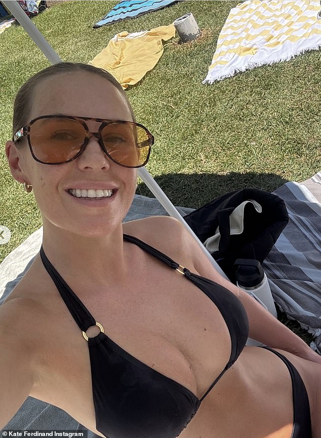 Among the carousel were two photos of Kate in bikinis - one in olive green, the other black - showing off her stunning figure as she soaked up the sun