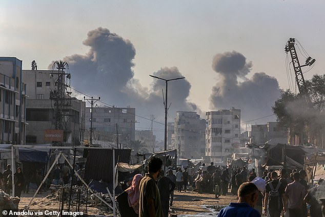 Smoke rises over Khan Yunis after an Israeli attack on southern Gaza, on July 22, 2025