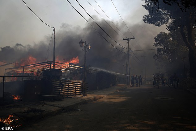 Several blazes have broken out in the country in the past month as the whole of the Europe is hit with a red-hot heatwave this summer. Pictured: Wildfire in Kryoneri on Saturday
