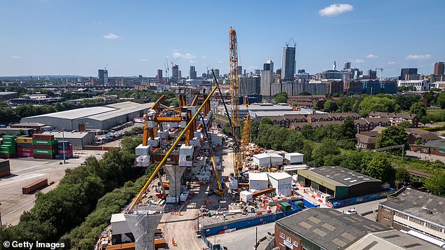 Risk management expert Stephen Cresswell repeatedly raised concerns that the cost of the high speed rail line - which could end up landing the taxpayer with a bill of more than £80billion - was being 'actively misrepresented'. Pictured: The HS2 Curzon No 2 viaduct in Birmingham, pictured in June