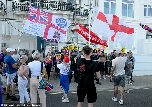 Pictured: Groups of protestors clash outside the Royal Beach Hotel in Southsea