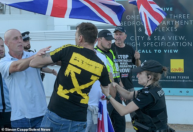 In Portsmouth, more than 40 anti–immigration demonstrators confronted almost 30 activists holding Stand Up to Racism placards outside the Royal Beach Hotel on Friday evening