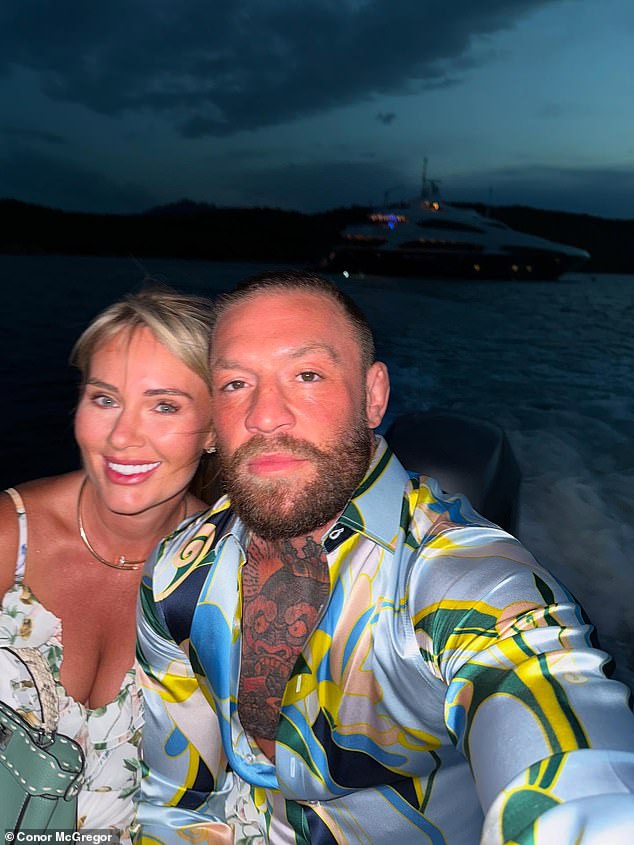 In the holiday carousel, the couple were all smiles as they headed to shore for a romantic dinner for two