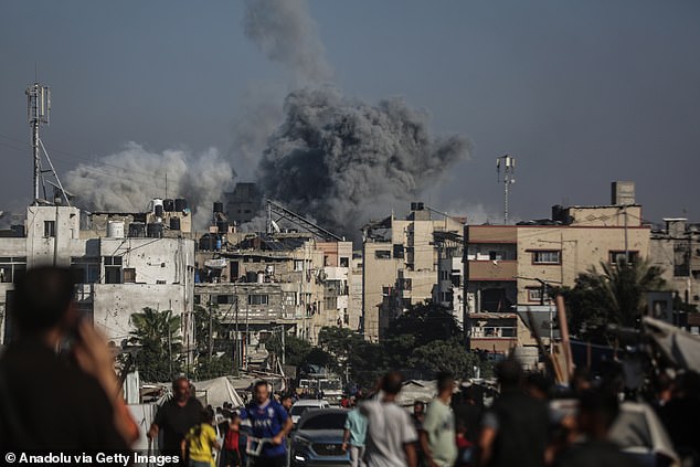 Smoke rises after an Israeli airstrike targeted a residential area in Gaza City, Gaza, on July 15, 2025