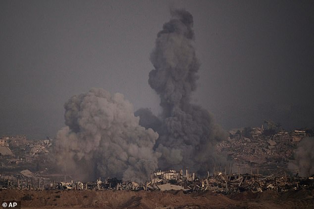 Smoke rises to the sky following an Israeli airstrike in the northern Gaza Strip as seen from southern Israel, Saturday, July 26, 2025