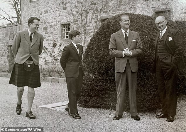 A young Prince Charles arriving at Gordonstoun with Sir Iain Tennant (left), the late Prince Philip and headmaster Robert Chew (right)