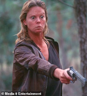 She also bleached and thinned her eyebrows and wore a set of prosthetic crooked, stained teeth
