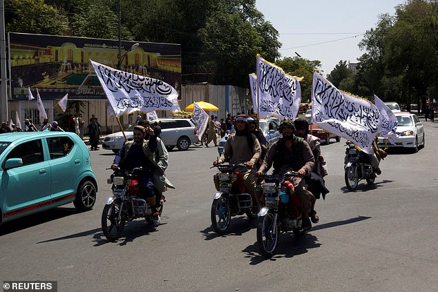 The scheme was set up for those who worked with British forces to flee the murderous Taliban. Pictured: Members of the Taliban in a rally to mark the third anniversary of the fall of Kabul in Kabul in August last year