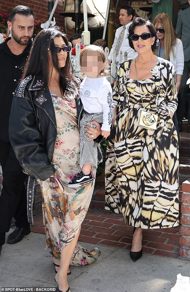 Kourtney Kardashian was also spotted outside the restaurant, holding her 20-month-old son Rocky