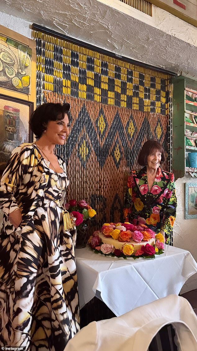 Both Khloe and Kylie shared a photo of Kris and MJ with a floral birthday cake