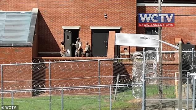 Maxwell was seen returning to the prison on Thursday carrying a cardboard box