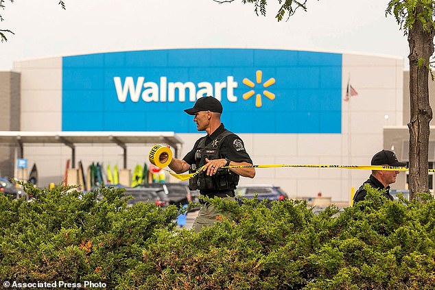 Grand Traverse Sheriff's deputies tape off the parking lot of a Walmart after a stabbing incident