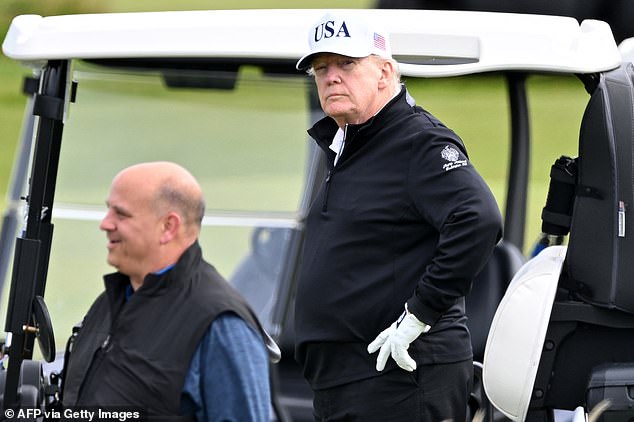 Security was tight and protesters were kept some distance away, unable to be seen by the group during Trump's round of golf on his Turnberry course