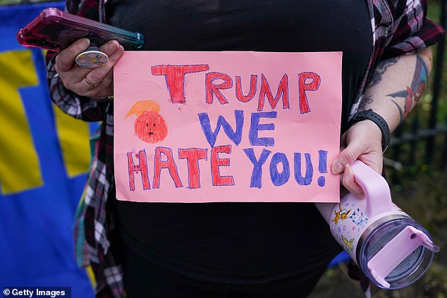 Some signs were direct in their messaging to the 47th American president