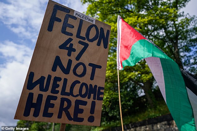 There was no shortage of signs opposing Trump's visit