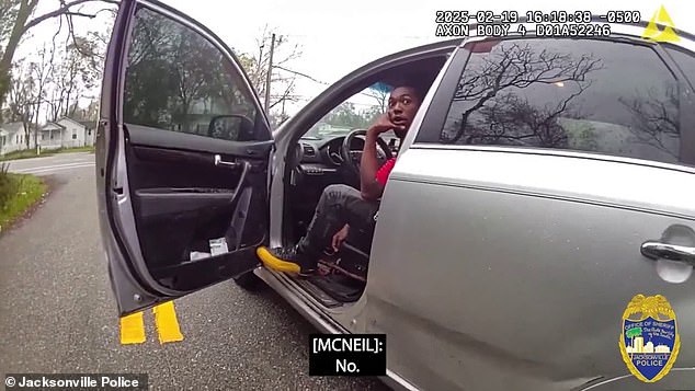 Body camera footage showed McNeil had the door open when he was first pulled over