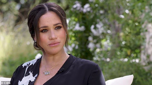 Meghan during her Oprah Winfrey interview in 2021. Royal author Valentine Low claimed she 'hijacked the narrative' which at first quashed any complaints about her own behaviour