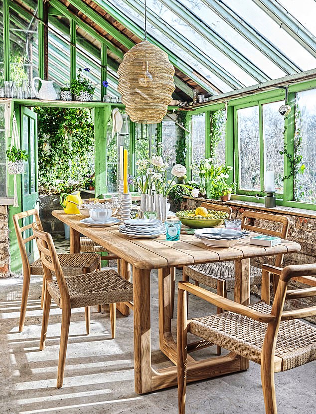 Choose furniture that allows you to make the most of the space all year round. Here a dining table can be used for summer soirées and cosy winter meals. Just add throws and candlelight. Six-seater outdoor dining table, £1,695, grahamandgreen.co.uk. For a similar shade of paint, try Fresh Green from yescolours.com.