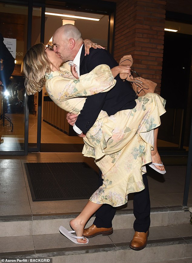 They packed on the PDA as they left the wedding venue