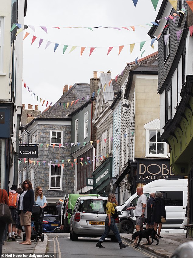 A busy morning in Totnes town centre. While most shops remain independent, some brands such as Fatface, Mountain Warehouse and WHSmith do have stores in the town