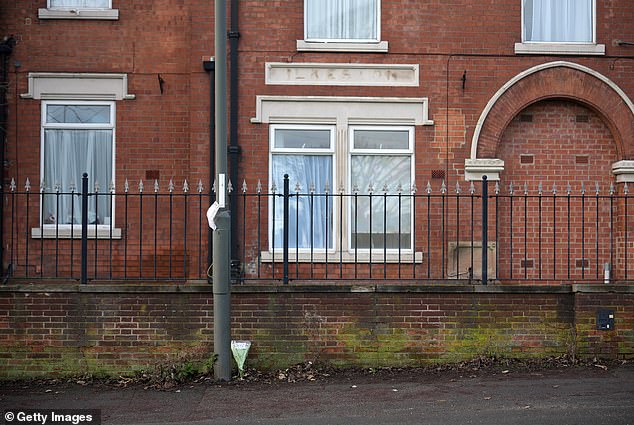 Floral tribute lays near the scene in Rose Avenue, Ilkestone, where the 18-year-old man was stabbed