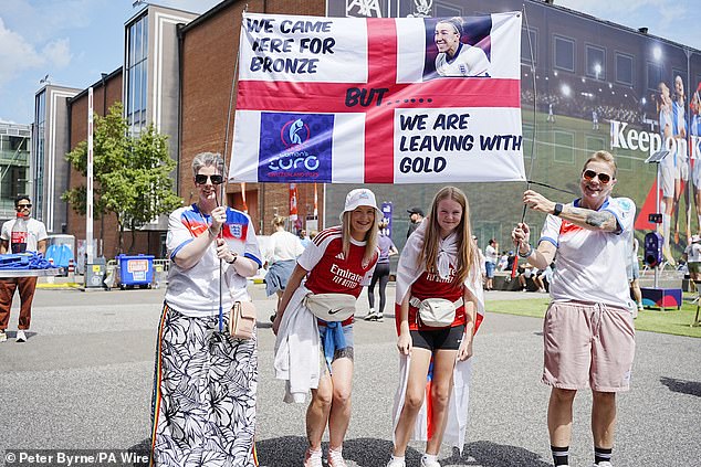 Fans waved flags in excitement as football fever sweeps across the country