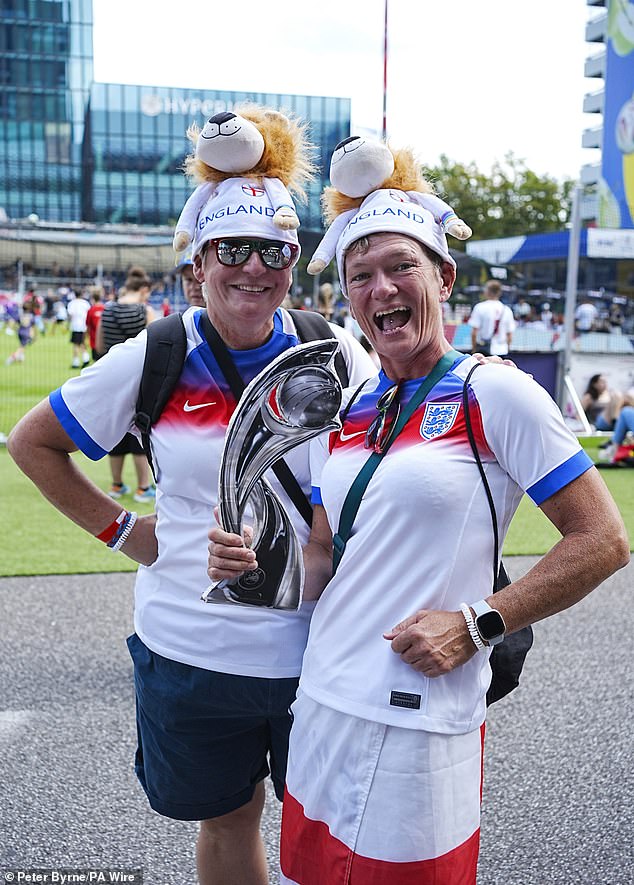 Two very happy looking fans in Basel on Sunday