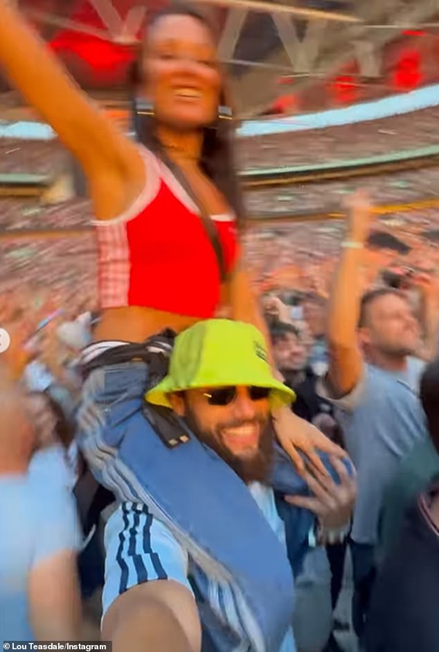 The couple looked happier than ever at the band's reunion gig after it was reported that he was questioned twice by Greek police over a series of bust-ups with Lou while on holiday in Mykonos