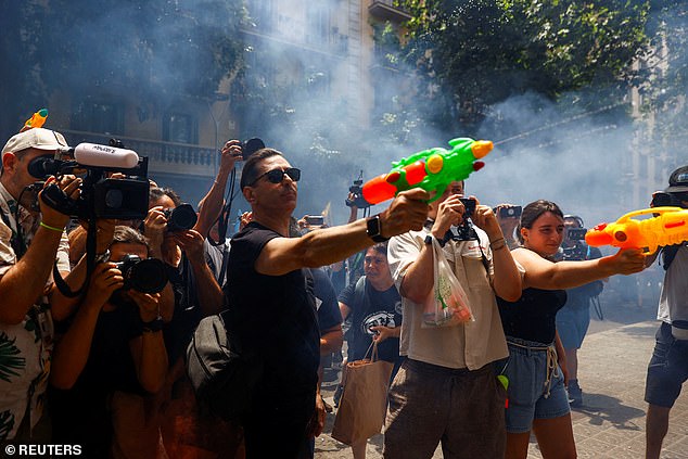 Protestors set off smoke and even fired water pistols at holidaymakers during the protests