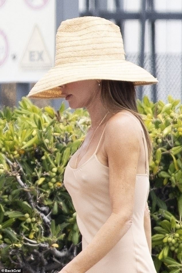 In a piece akin to her classic designs, Victoria went braless as she departed her family's yacht