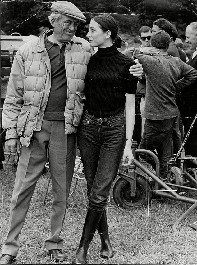 Anjelica Huston was less than keen to make her screen debut at 16 working for her father John Huston; they are pictured when she was 16 on the set of another film