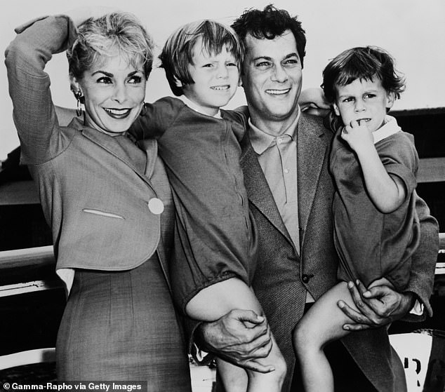 Jamie Lee Curtis is pictured aged three (right) with her sister Kelly and their parents Janet Leigh and Tony Curtis in 1961, the year the Old Hollywood couple got divorced