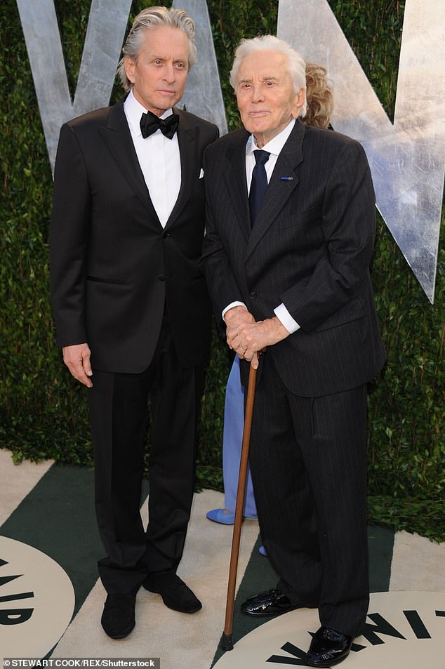 Since Kirk died in 2020 at the grand old age of 103, Michael has been a steward of his legacy, for example by plugging his charity the Douglas Foundation; father and son pictured in 2012