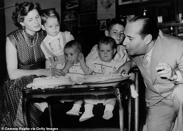 Isabella Rossellini and her twin sister Isotta are pictured on their first birthday in 1953 with their brother Robertino, half-brother Renzo and parents Ingrid Bergman and Roberto Rossellini