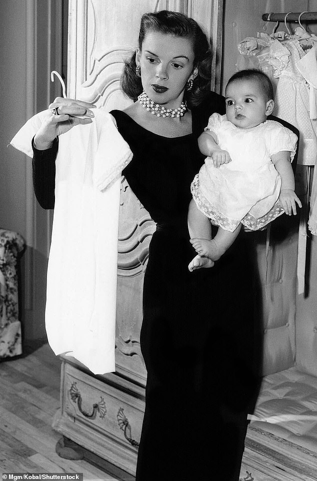 Although she proved her talents in Hollywood, on Broadway, and in concert, public perception always placed Liza in Judy's shadow; Judy and Liza are pictured in 1947