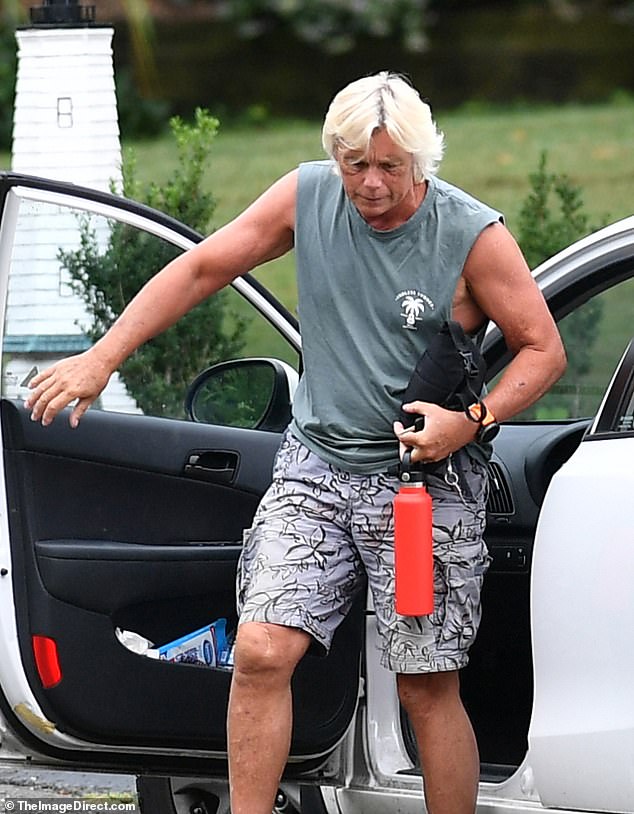 He was seen running errands around town, which included a stop at a gas station to fill up