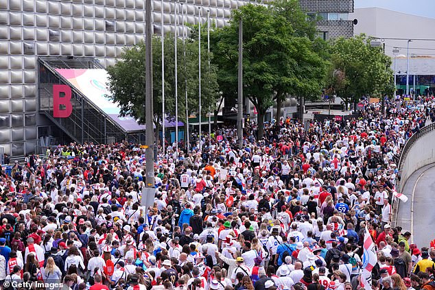 England fans pack out the area outside the stadium in Basel, Switzerland ahead of tonight's big game
