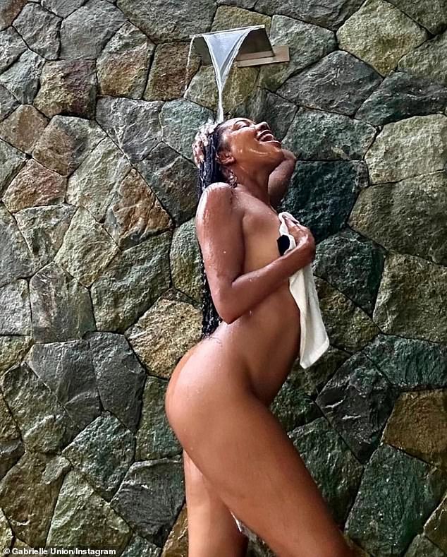 Engaging her audience of 21.4 million, the Bring It On actress shared a racy snapshot as she showered in the buff, using a white washcloth to cover her modesty