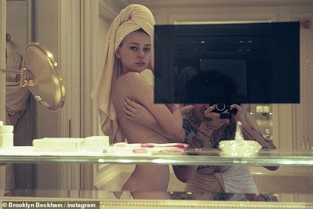Nicola's naked bath snap isn't the first time she has stripped off for racy photo as in 2021 she posed completely naked while shirtless Brooklyn, took photographs of her