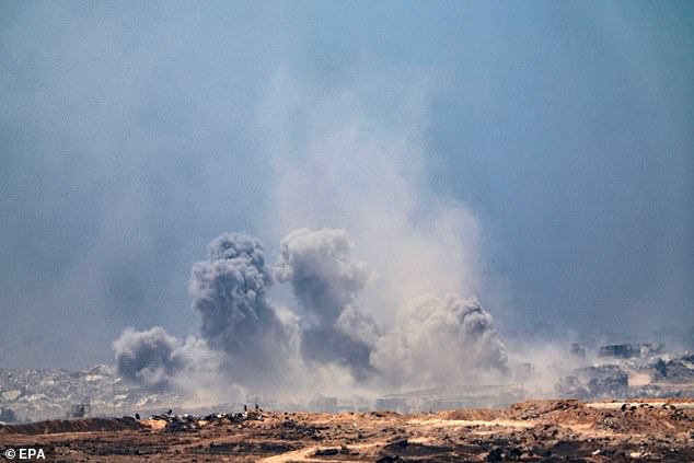 Smoke rises from an Israeli airstrike in the northern part of the Gaza Strip near Beit Hanoun, as seen from the Israeli side of the border, July 27, 2025