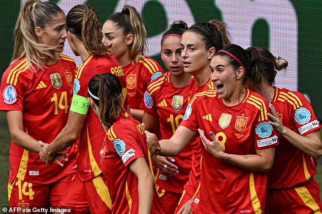 Spain took the lead after Mariona Caldentey (right) crept in ahead of Lucy Bronze to score
