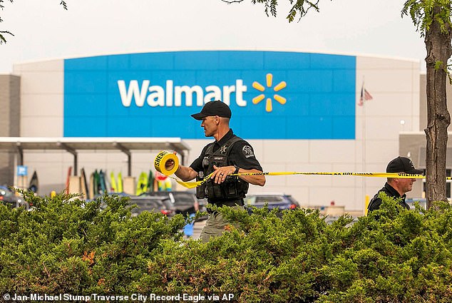 Grand Traverse Sheriff's deputies tape off the parking lot of a Walmart after a stabbing incident