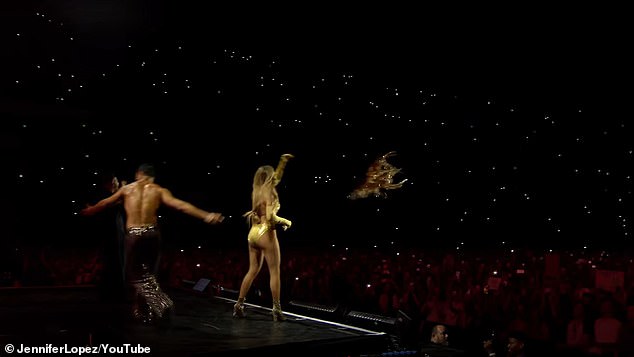 She then grabbed the offending piece of clothing, threw it into the crowd and told the person who caught it, they could keep it