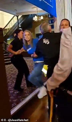 The spectators were seemingly dragged out by security in Blackpool