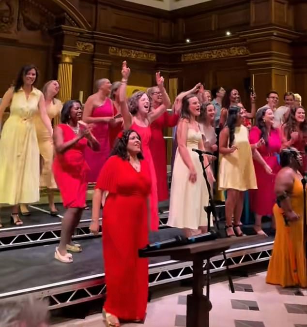 The City Academy Voices choir was coming to the end of their performance (pictured) at St Andrew's church in Holborn, central London, on Friday night when all of the lights were suddenly turned on